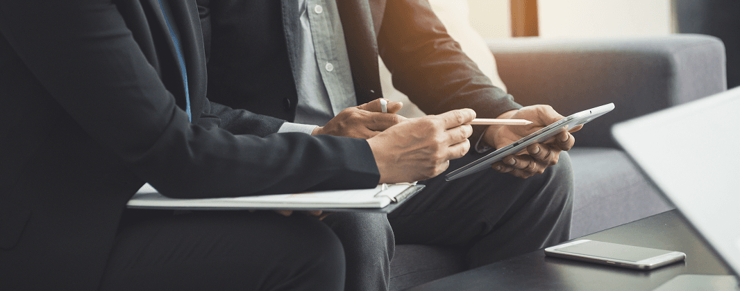 Employees using digital tools for collaboration