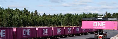 Reach stalker loading container onto intermodal rail