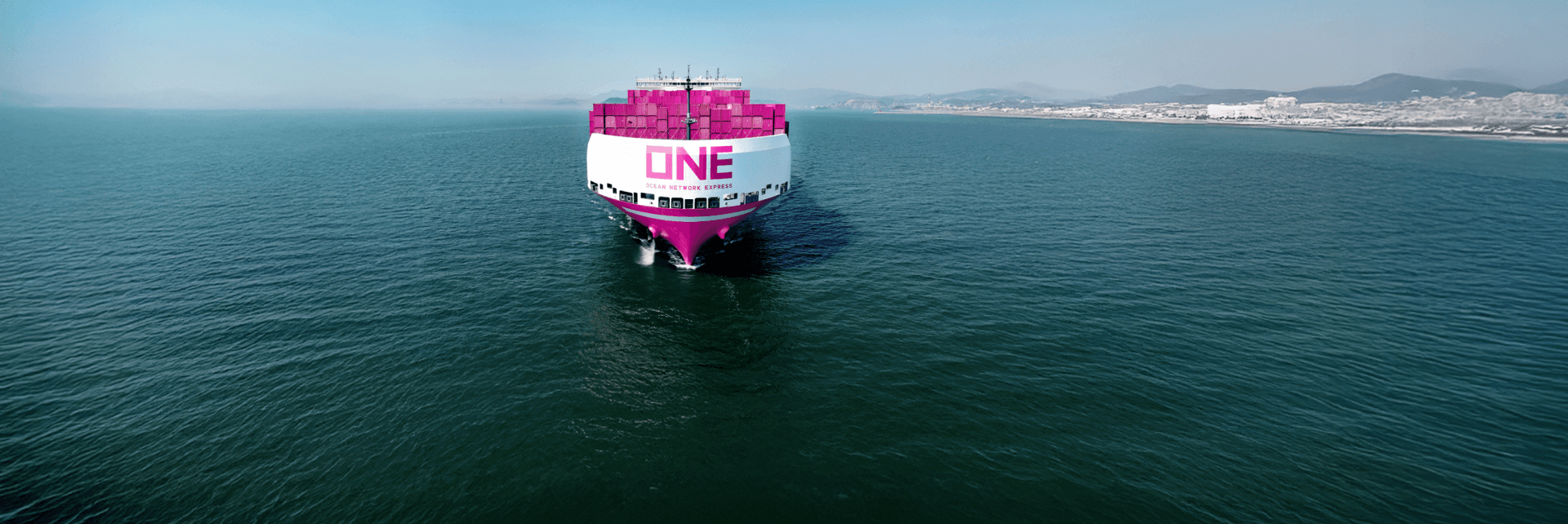 Modern ONE container ship delivering cargoes to global ports