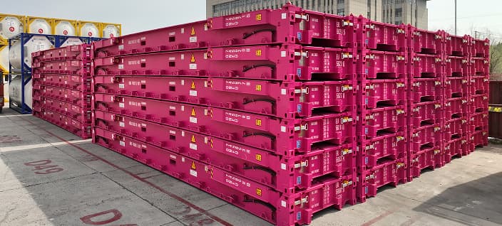 Stacked magenta ONE flat rack containers for special project cargo at depot