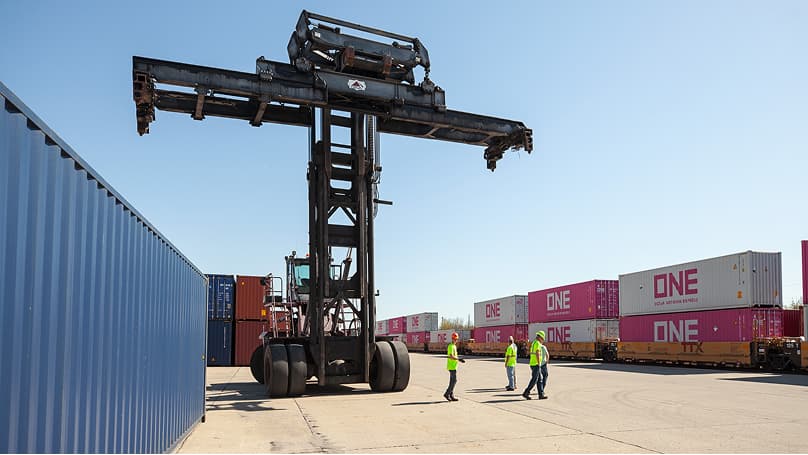ONE employees monitoring safe container handling operations